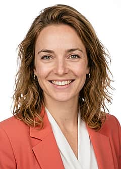 Coral blazer over white blouse outfit preview