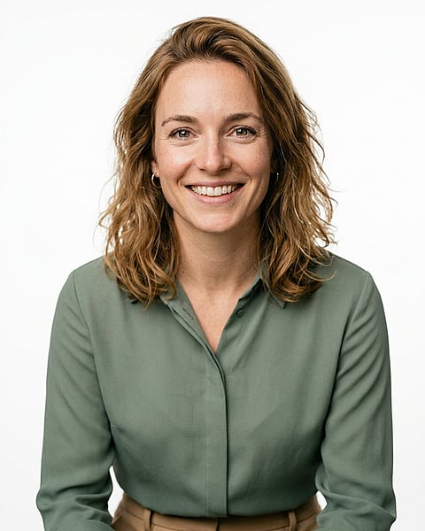 White / Pure White Studio · Tan tailored trousers + sage green blouse headshot example