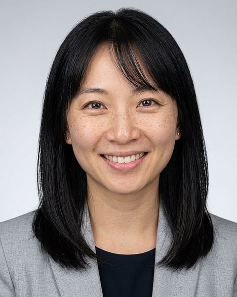Neutral Gradient / Light Grey · Light gray blazer headshot example