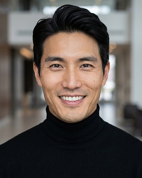 Lobby · Fitted black turtleneck headshot example