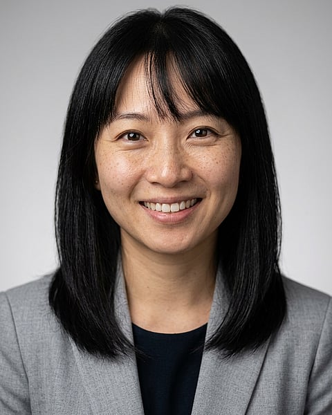 Neutral Gradient / Light Grey · Light gray blazer headshot example