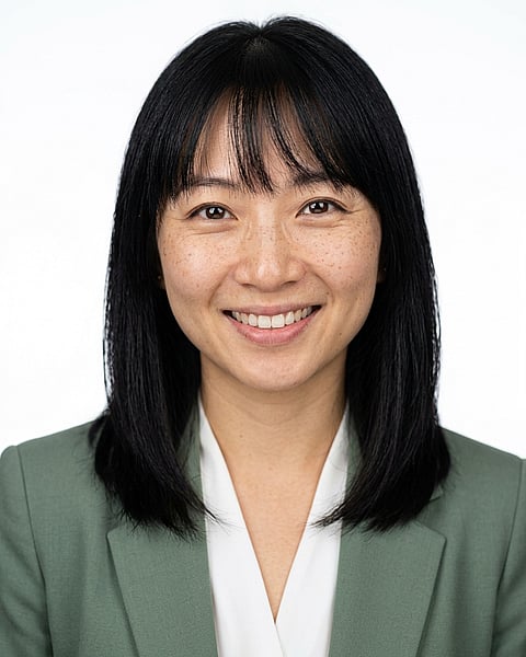 White / Pure White Studio · Sage green blazer with white blouse headshot example