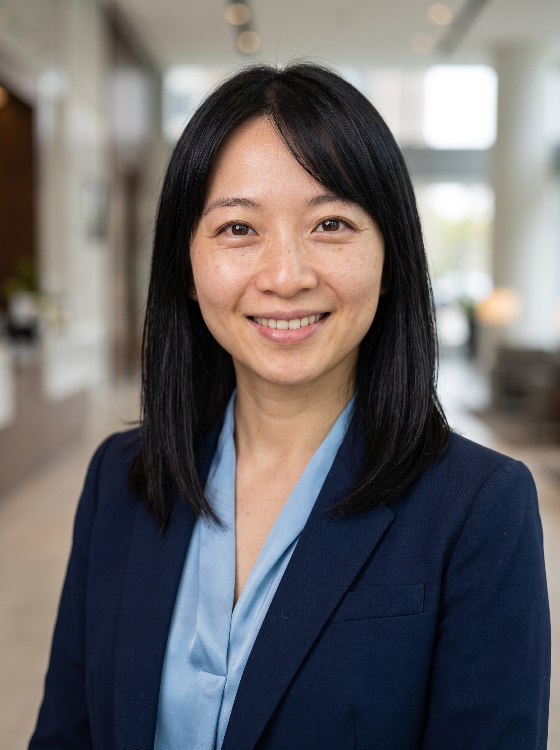 Corporate Lobby · Navy Blazer headshot example
