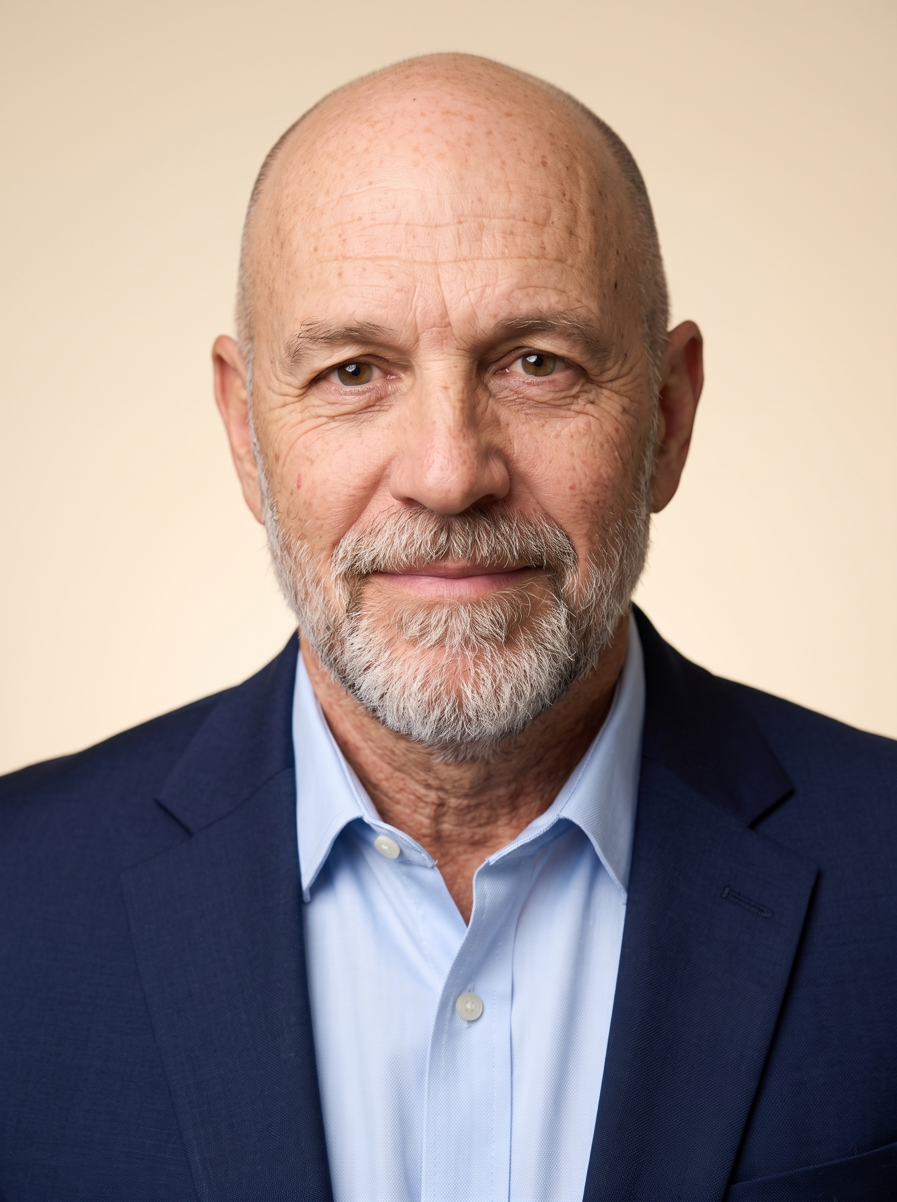 Warm Studio · Navy Blazer headshot example